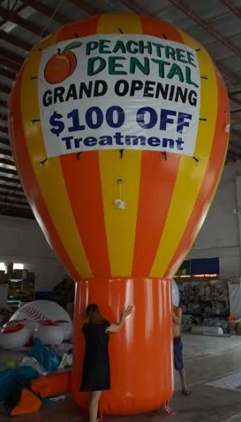 Orange Yellow Rooftop Ad Peachtree Dental Grand Opening Balloon - Advertising Balloons Gallery Image