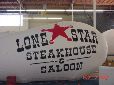 White Black Advertising Lone Star Steakhou Saloon Blimp - Helium Blimps Gallery Image