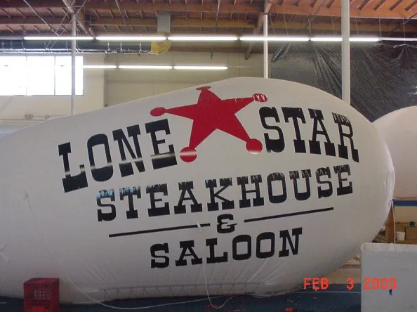 White Black Advertising Lone Star Steakhou Saloon Blimp - Helium Blimps Gallery Image