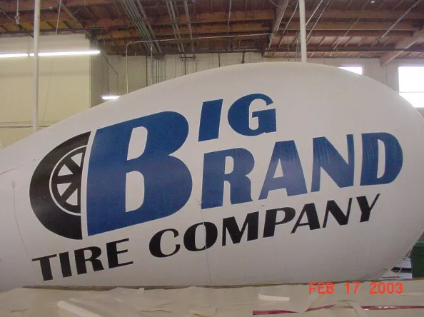 White Blue Advertising Big Brand Tire Company Blimp - Helium Blimps Gallery Image