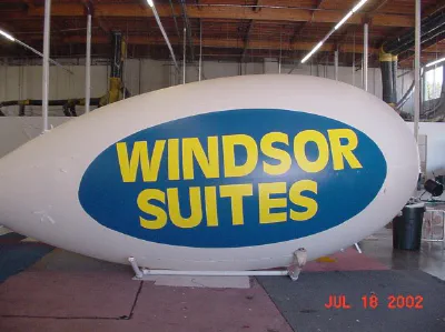 White Blue Advertising Windsor Suites Blimp - Helium Blimps Gallery Image
