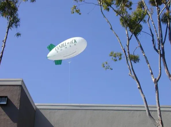 White Green Advertising Candle Duck Homes Blimp - Helium Blimps Gallery Image