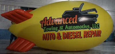 Yellow Red Advertising Advanced Towing Automotive Blimp - Helium Blimps Gallery Image