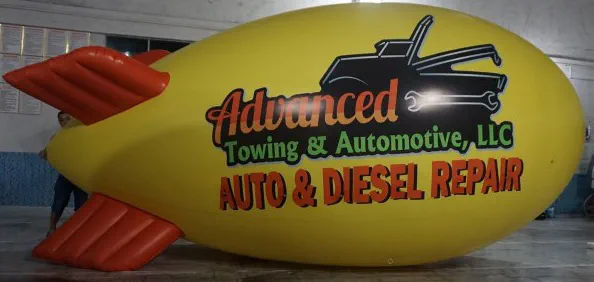 Yellow Red Advertising Advanced Towing Automotive Blimp - Helium Blimps Gallery Image