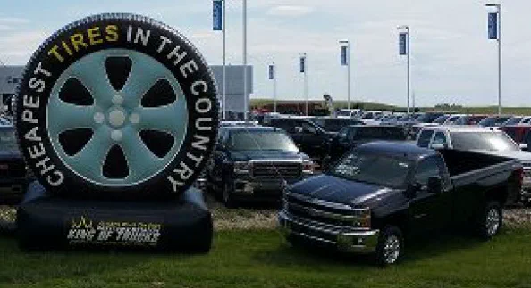Black Custom Cheapest Tires Country Inflatable - Custom Inflatables Gallery Image