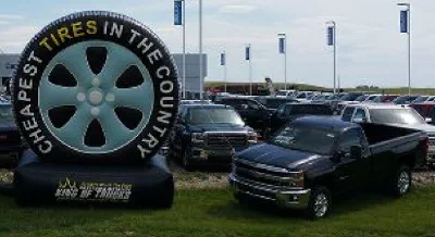 Black Custom Cheapest Tires Country Inflatable - Custom Inflatables Gallery Image