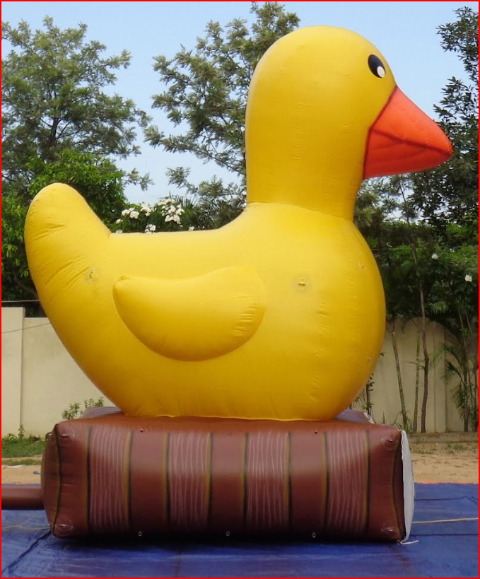 Custom Inflatable Rubber Duck on Log Base for Spa Store - Custom Inflatables Gallery Image