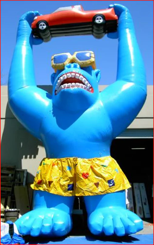 Blue Inflatable Gorilla Holding Car for Promotions - Custom Inflatables Gallery Image